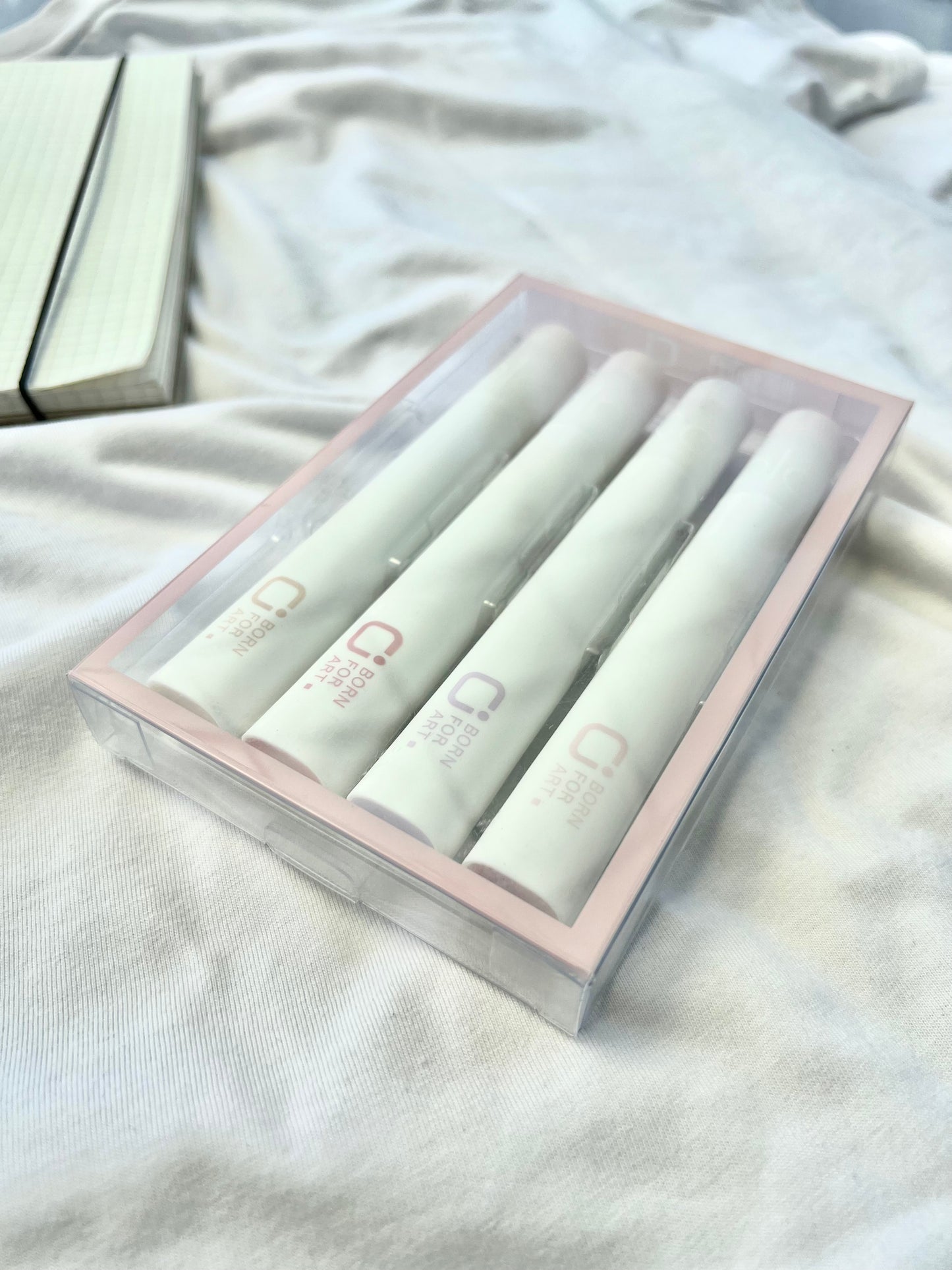 Box of 4 Born For Art Highlighter Pens placed upon a white backdrop available at Point Blank